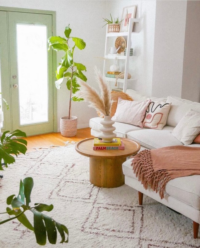 Light living room with subtle colors and greenery