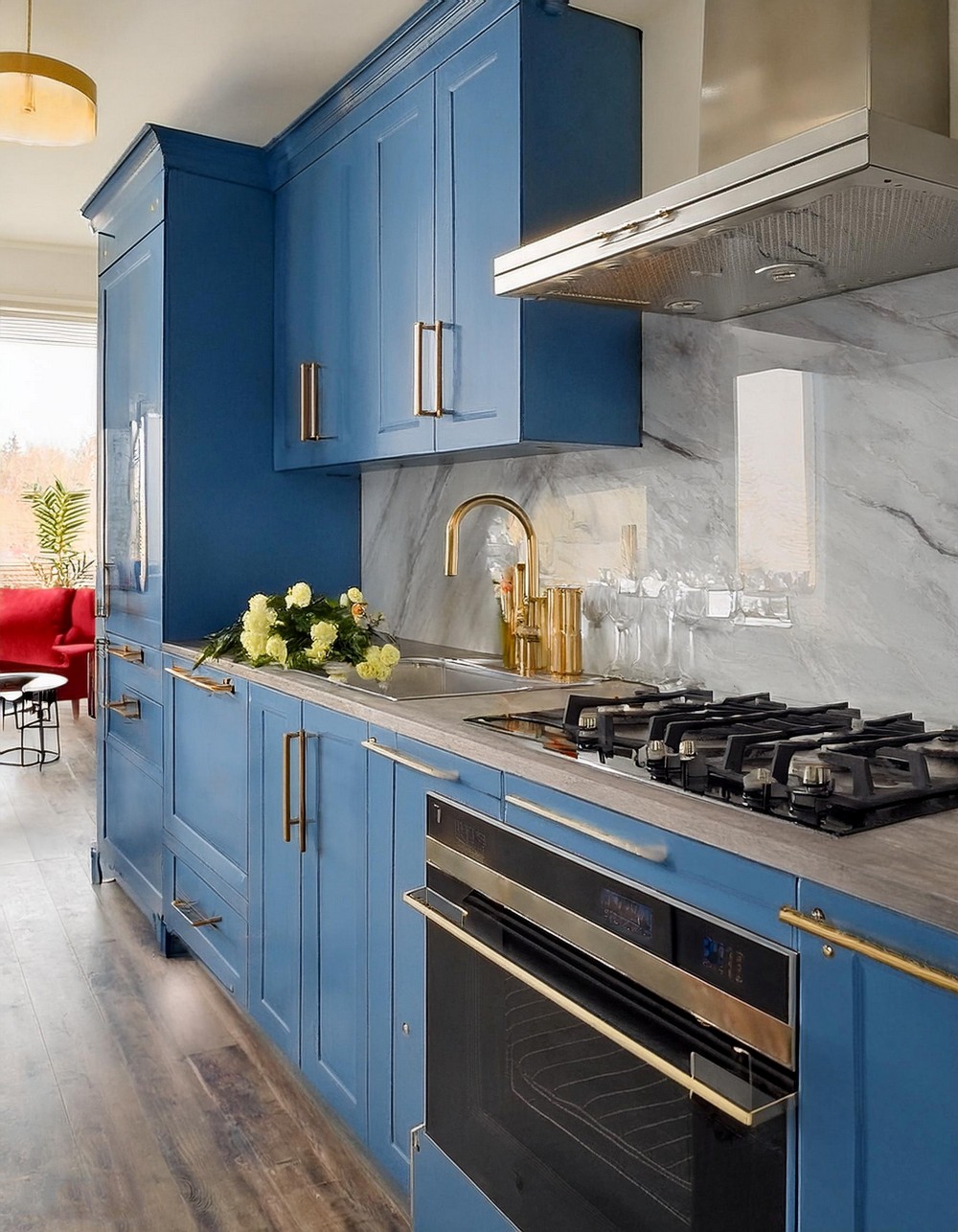 Bold Blue Cabinets With Geometric Marble